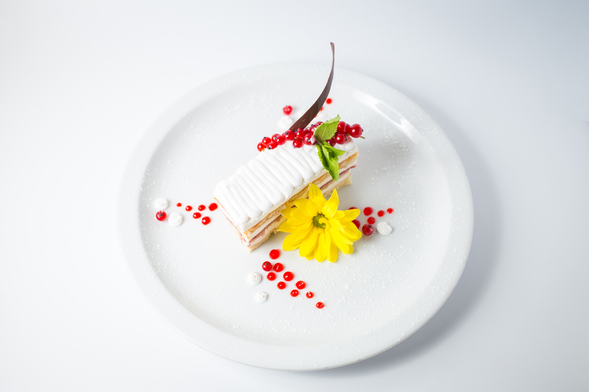 Finished plated dessert with precise garnish